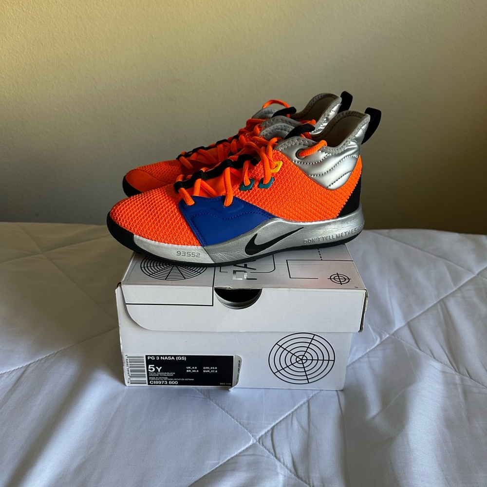 Paul’s George NASA Nike Kids' Orange, Blue, and Silver Sneakers